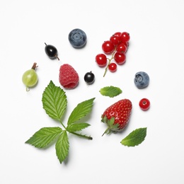 Mix of fresh berries on white background, flat lay