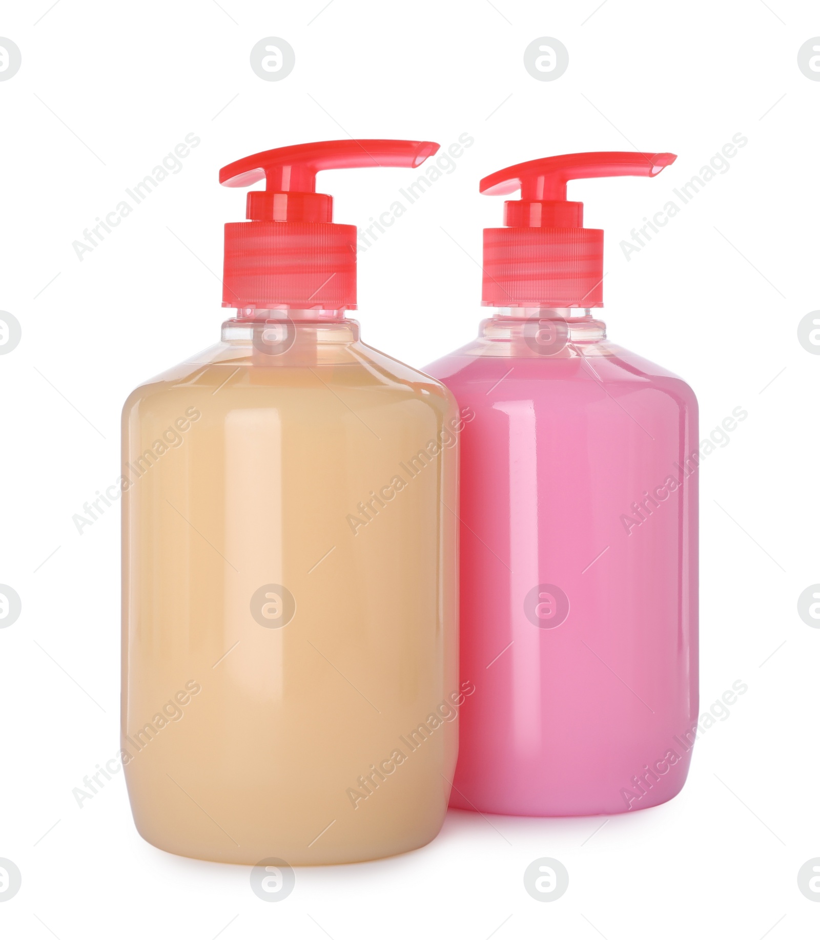 Photo of Dispensers of liquid soap on white background