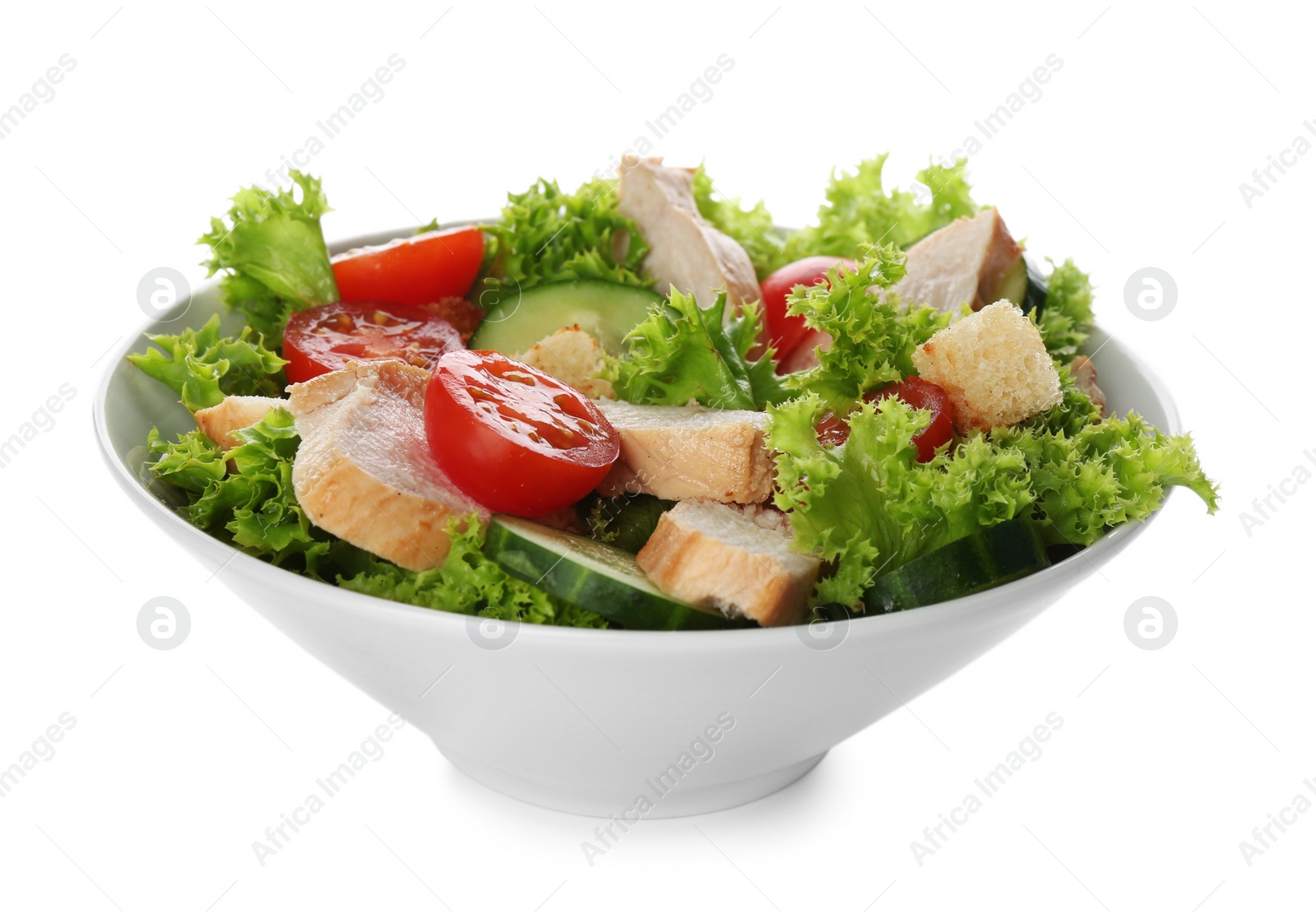 Photo of Delicious salad with chicken and vegetables in bowl isolated on white