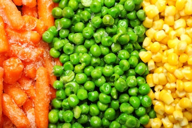 Photo of Mix of frozen vegetables as background, top view