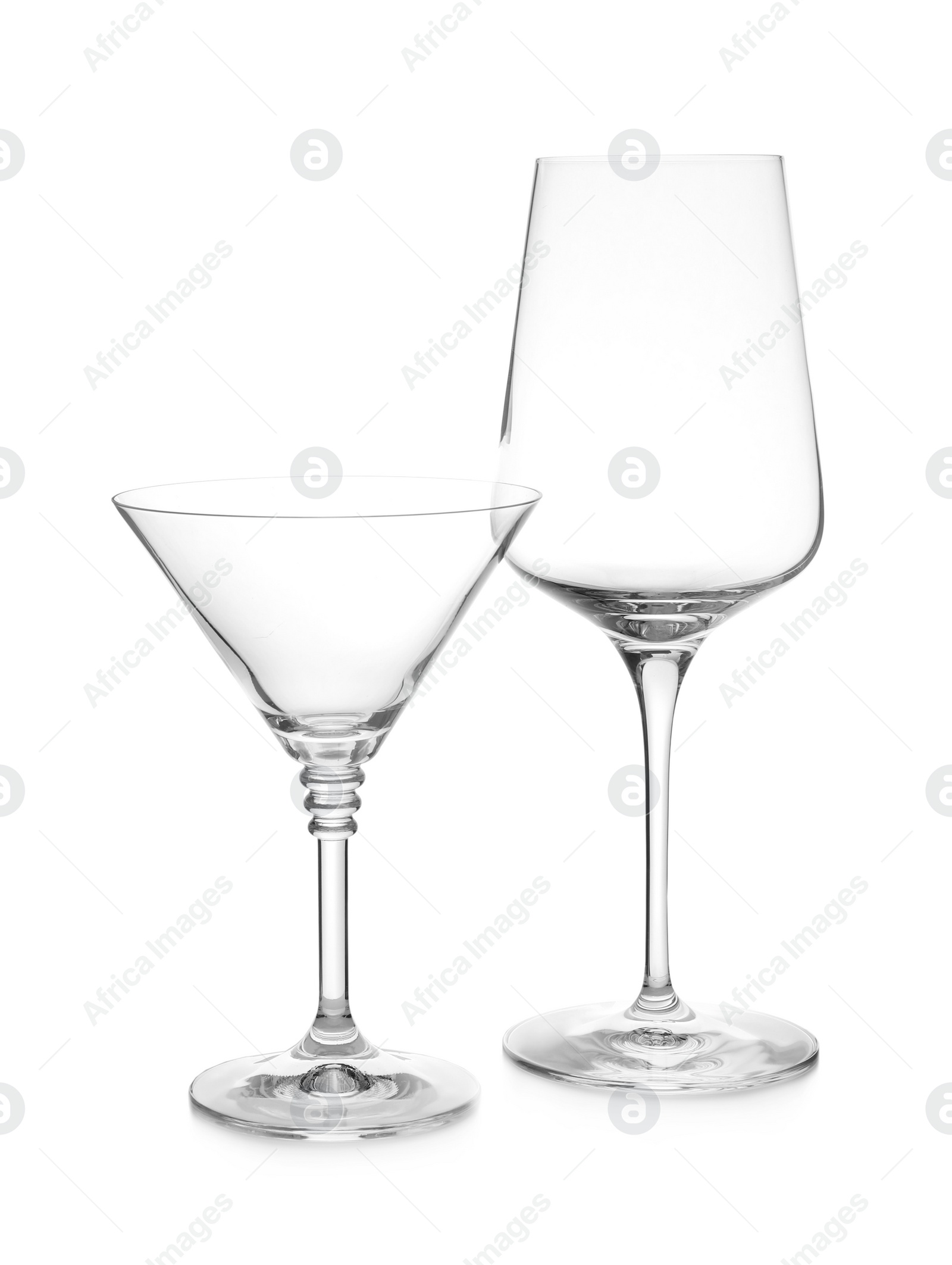 Photo of New clean empty glasses isolated on white