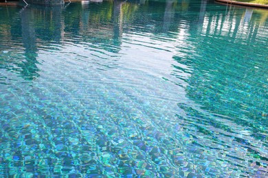 Photo of Clear rippled water in swimming pool outdoors