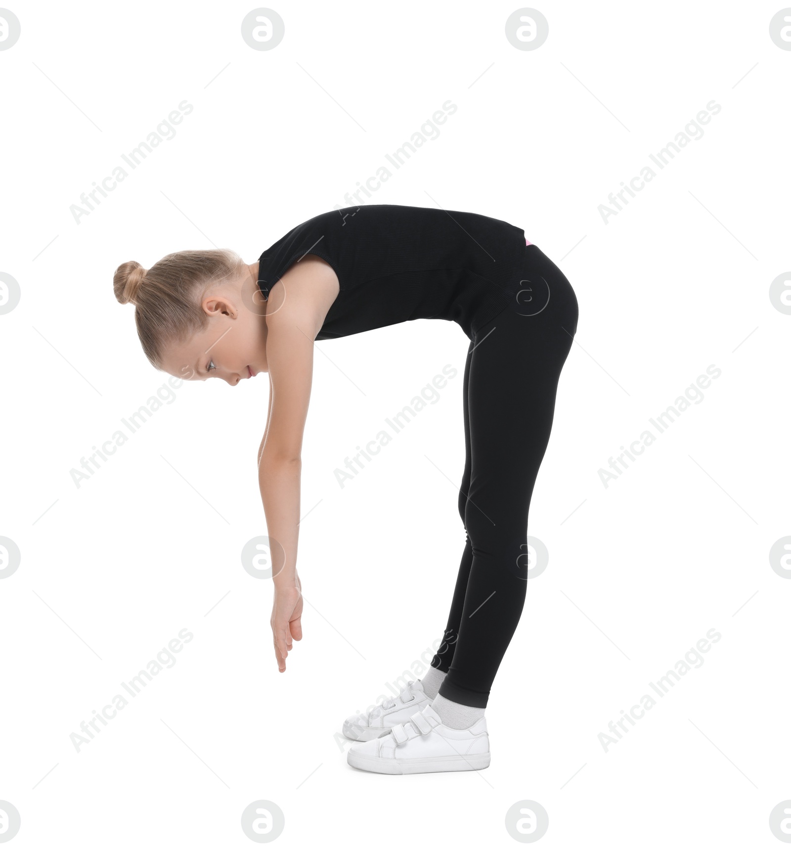 Photo of Little girl doing morning exercise on white background