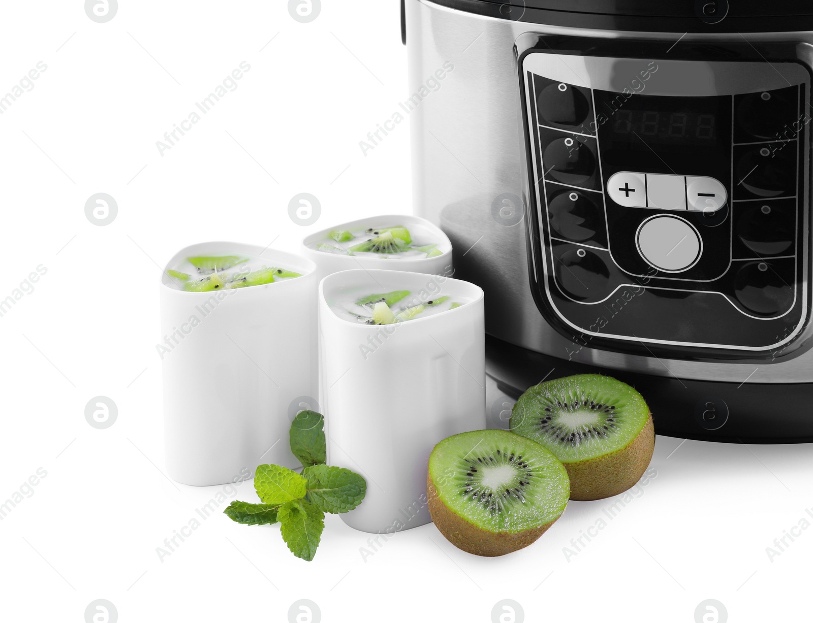 Photo of Modern multi cooker with cups of homemade yogurt and kiwi isolated on white