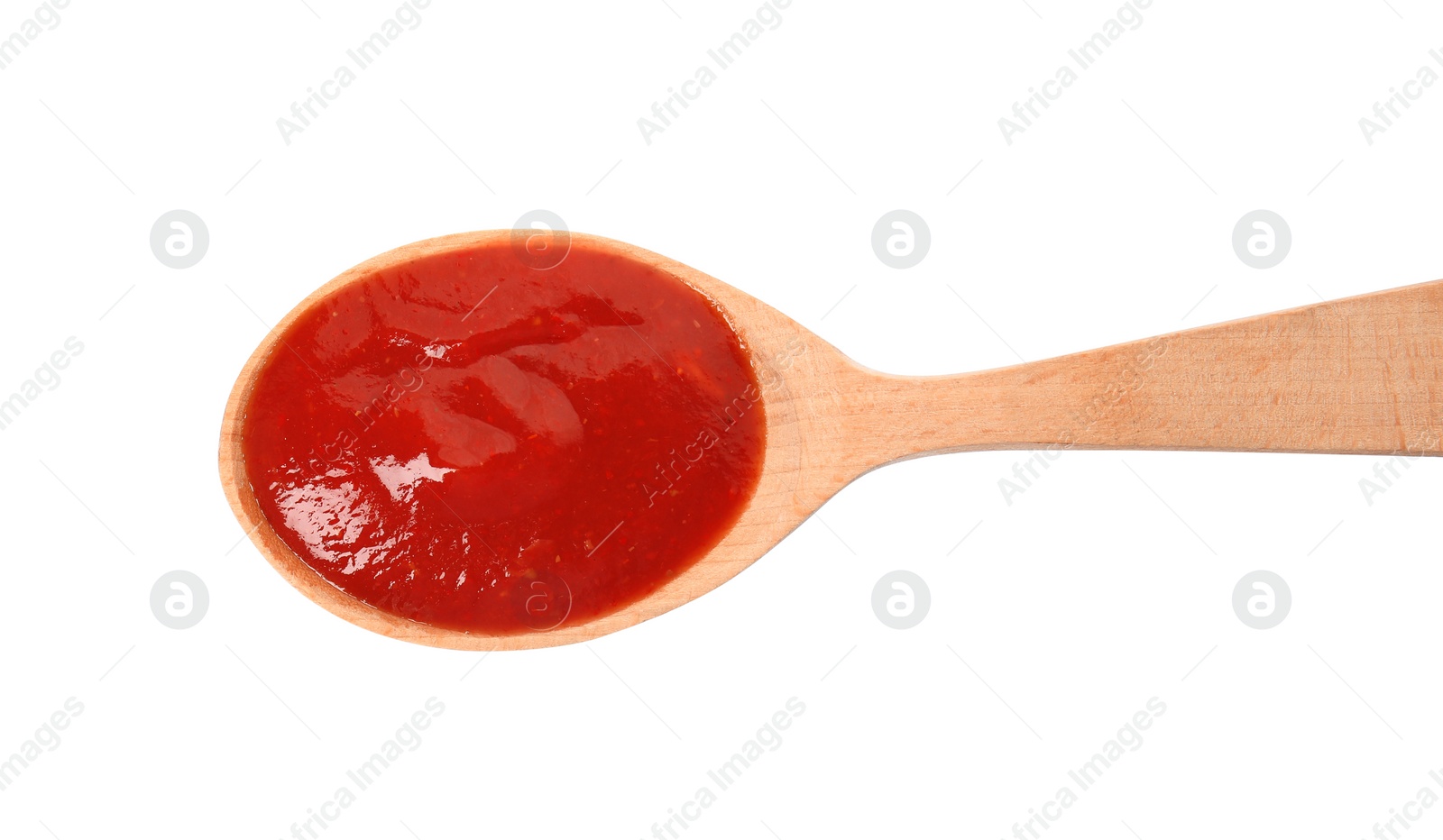 Photo of Spoon of tasty tomato sauce isolated on white, top view