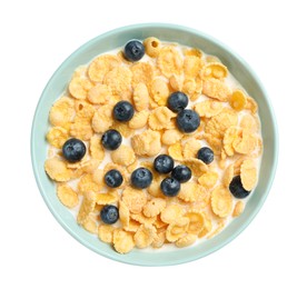 Photo of Bowl of tasty crispy corn flakes with milk and blueberries isolated on white, top view