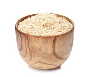 Photo of Bowl with raw unpolished rice on white background