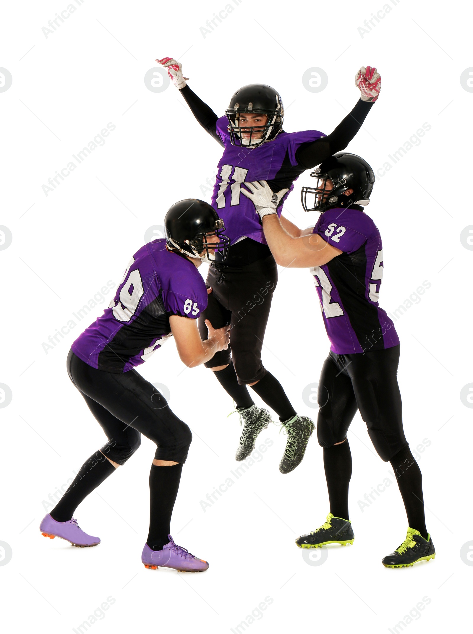 Photo of Men in uniform playing American football on white background