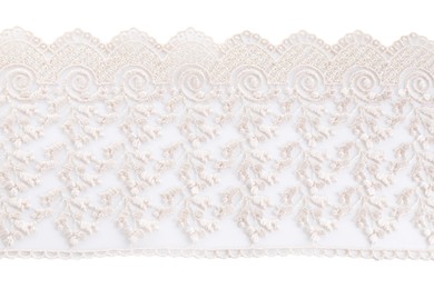 Photo of Beautiful lace isolated on white, top view