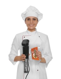 Photo of Chef holding sous vide cooker and salmon in vacuum pack on white background