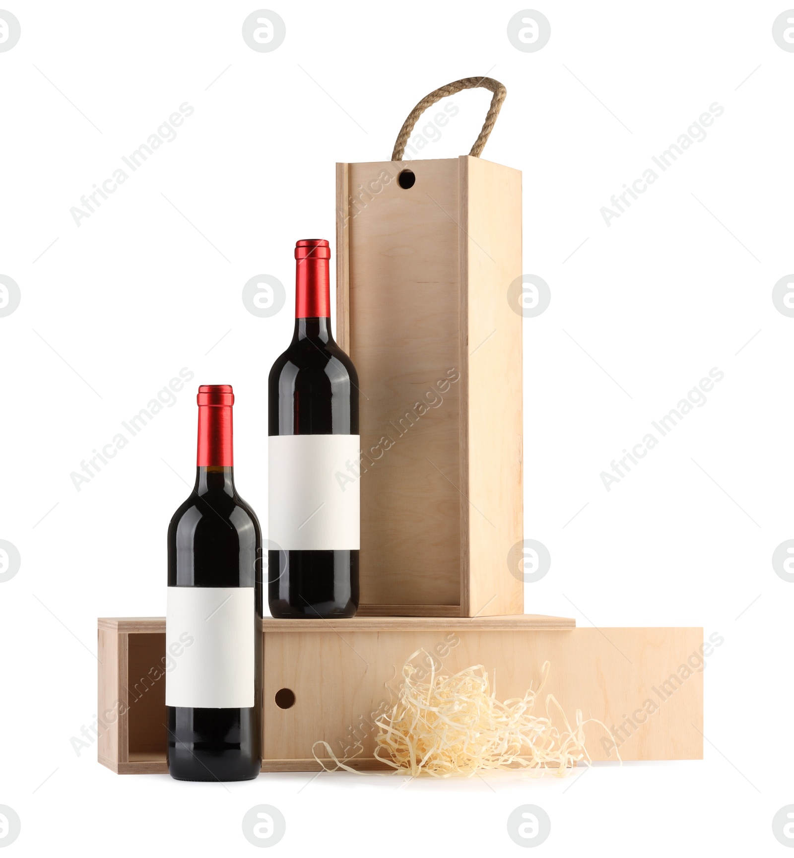 Photo of Wooden gift boxes with wine isolated on white