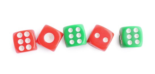 Photo of Many green and red game dices isolated on white, top view