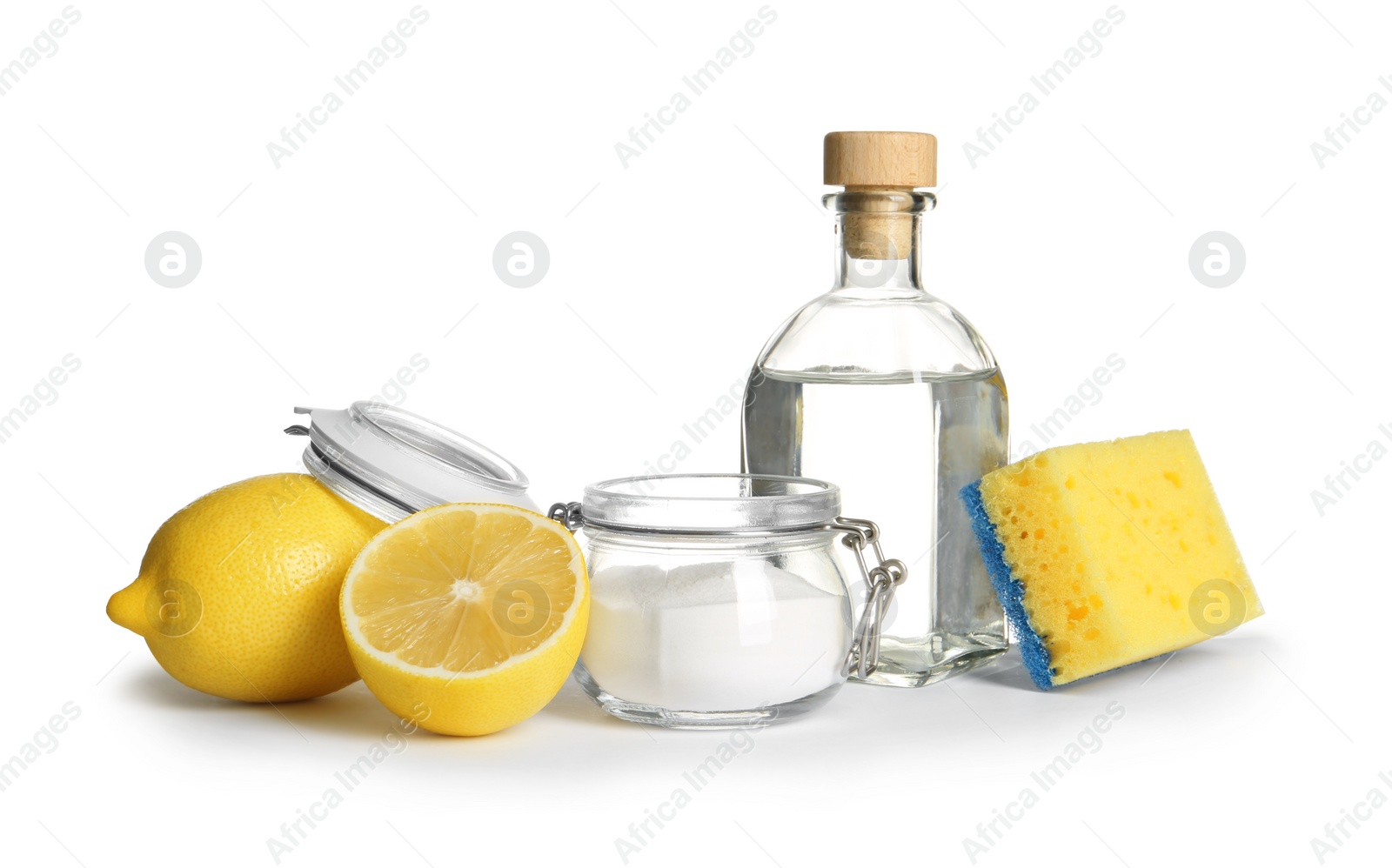 Photo of Composition with vinegar, lemons and baking soda on white background. House cleaning