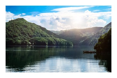 Image of Paper photo. Picturesque view of beautiful lake surrounded by mountains on sunny day
