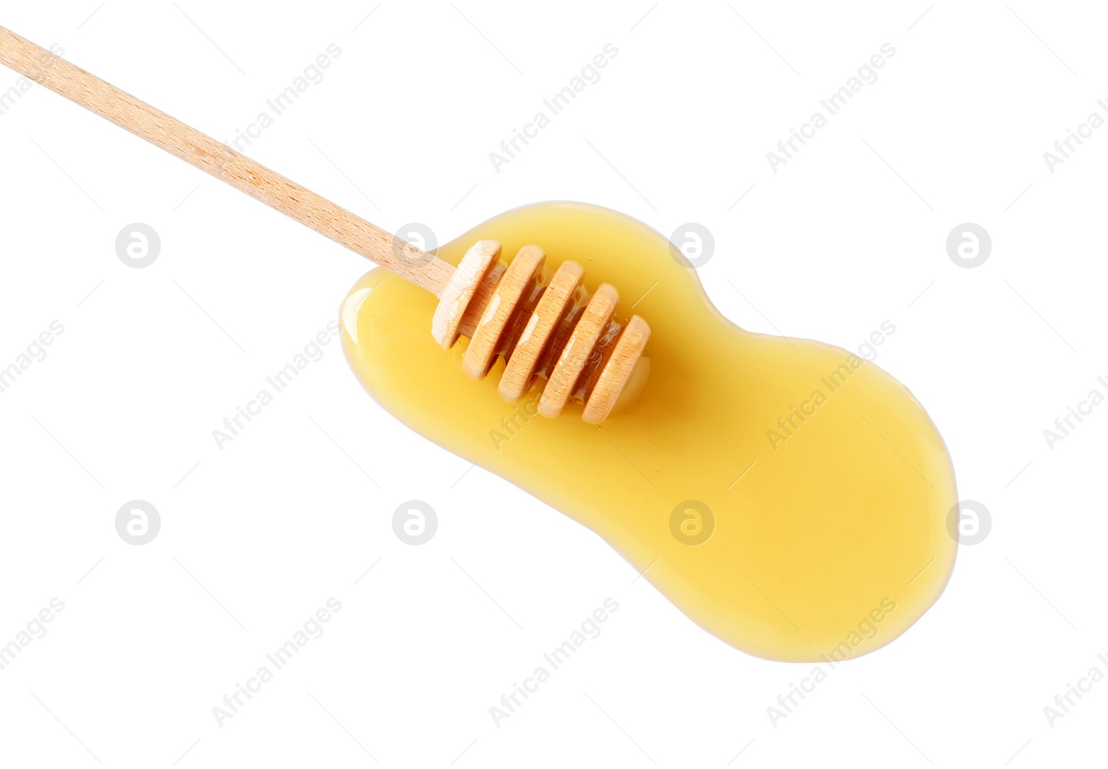 Photo of Wooden dipper and fresh honey on white background, top view