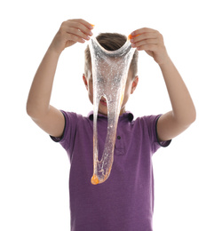 Photo of Little boy with slime on white background