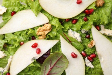 Delicious pear salad as background, top view