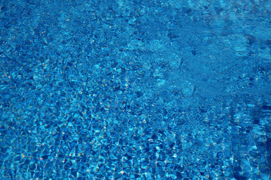 Outdoor swimming pool with clear water on sunny day