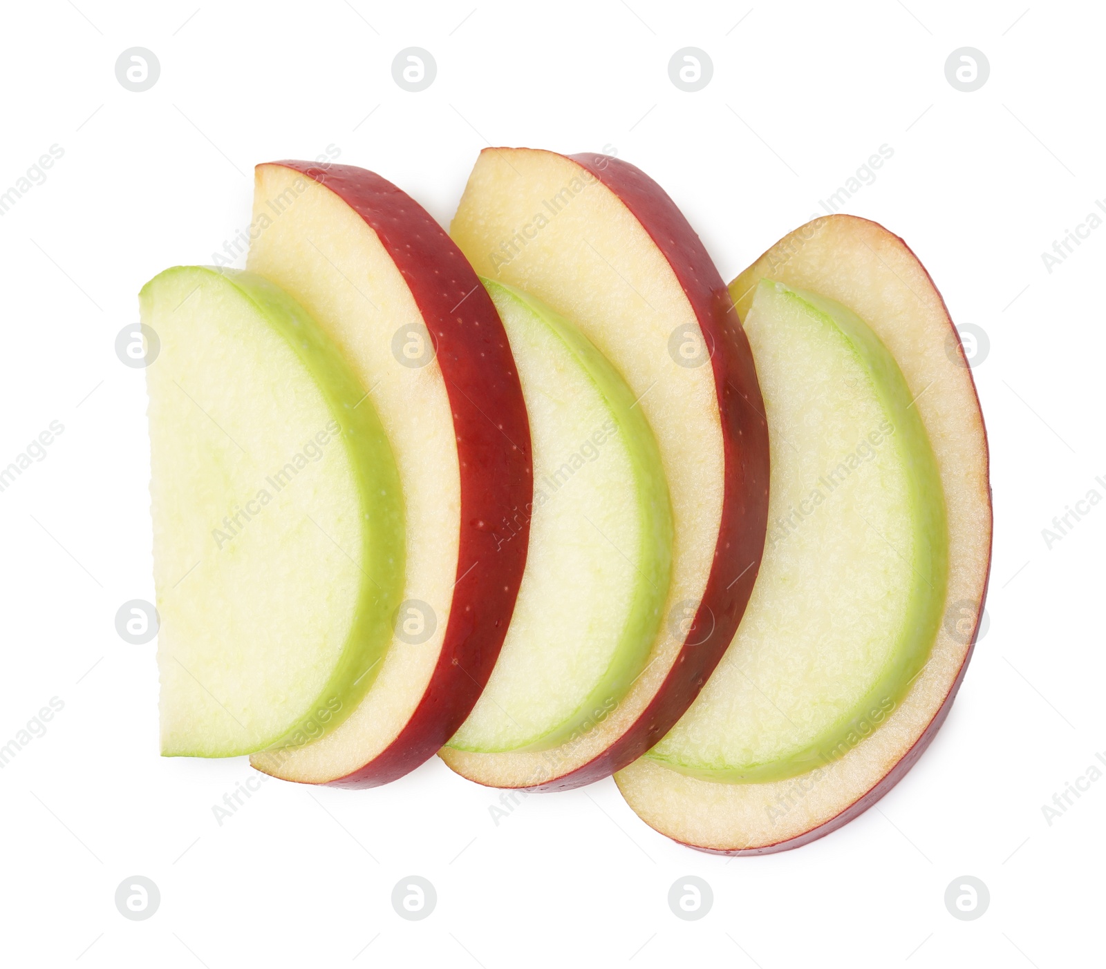 Photo of Slices of ripe apples isolated on white, top view