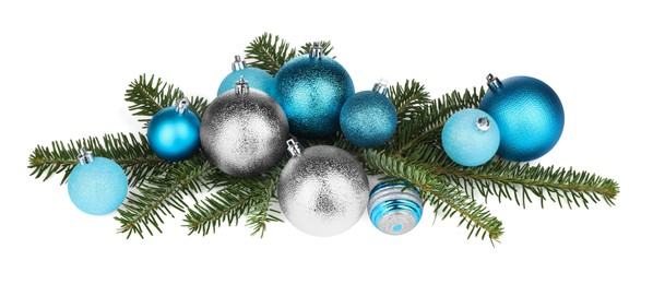 Photo of Beautiful Christmas balls and fir tree branches isolated on white