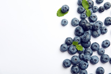 Flat lay composition with tasty blueberry and space for text on white background