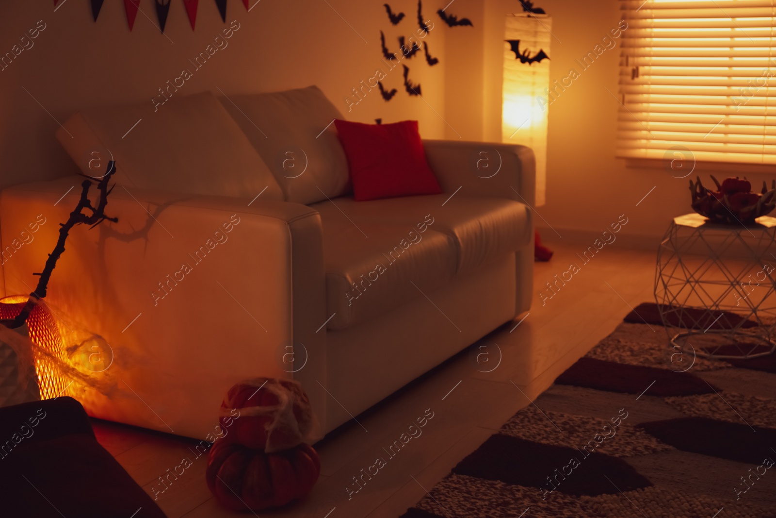 Photo of Modern room decorated for Halloween. Festive interior