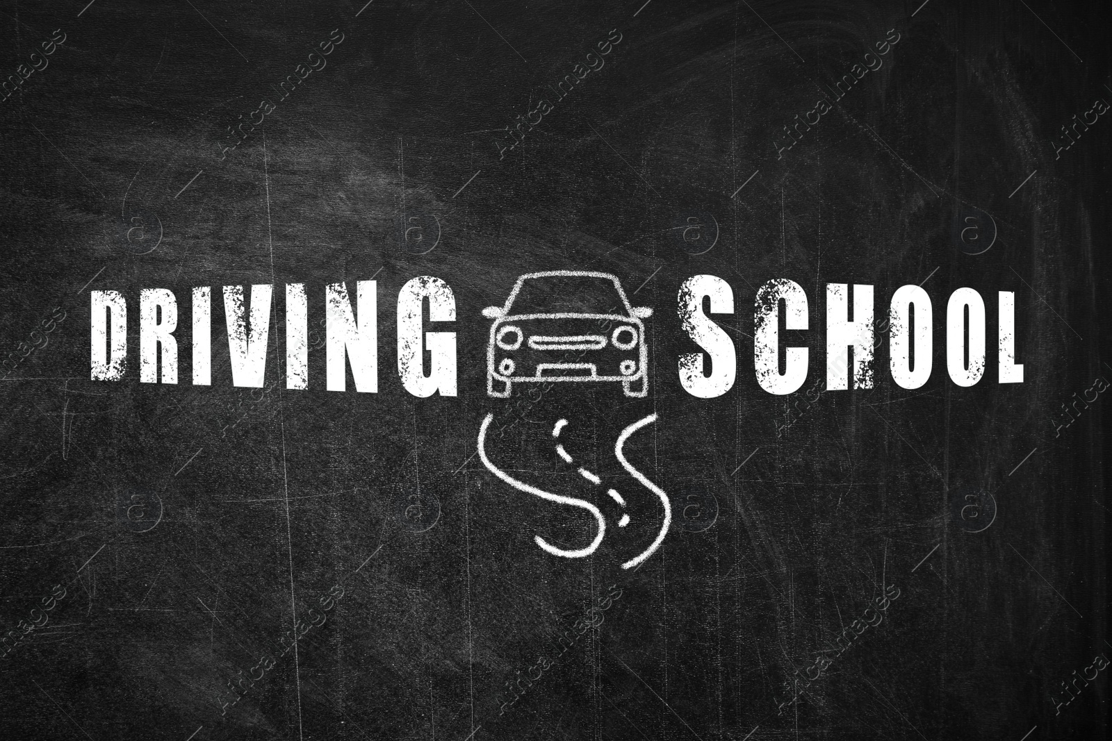 Image of Text Driving School and drawing of car on blackboard