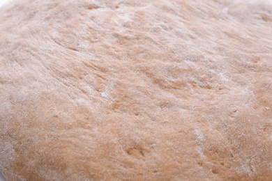 Photo of Raw rye dough as background, closeup
