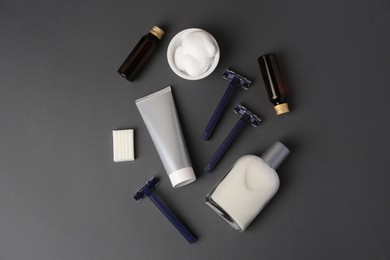 Photo of Flat lay composition with shaving accessories for men on grey background
