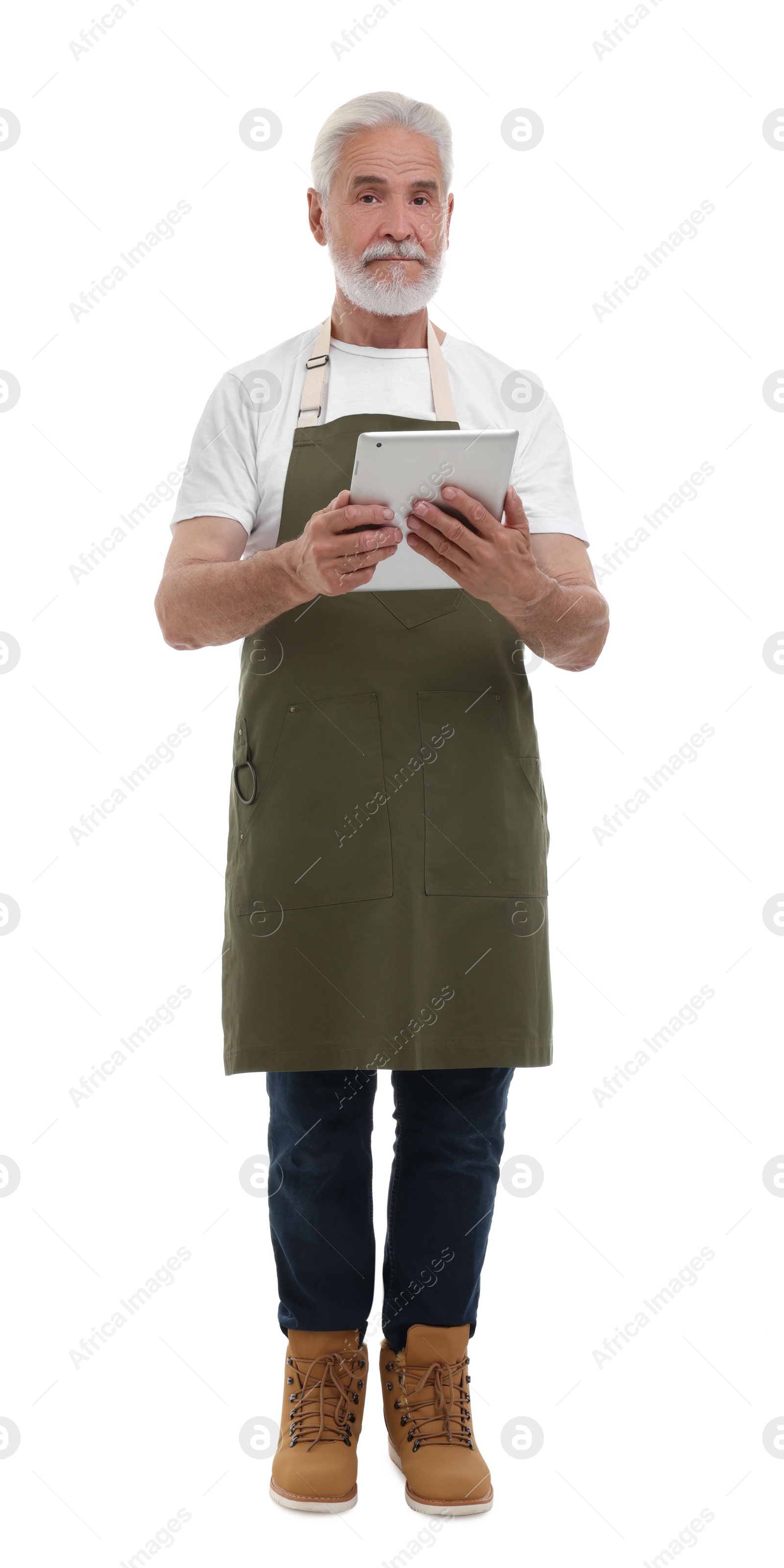 Photo of Senior man with tablet on white background