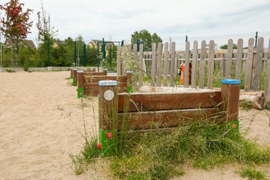 Photo of Wooden rover jump over on animal training area outdoors