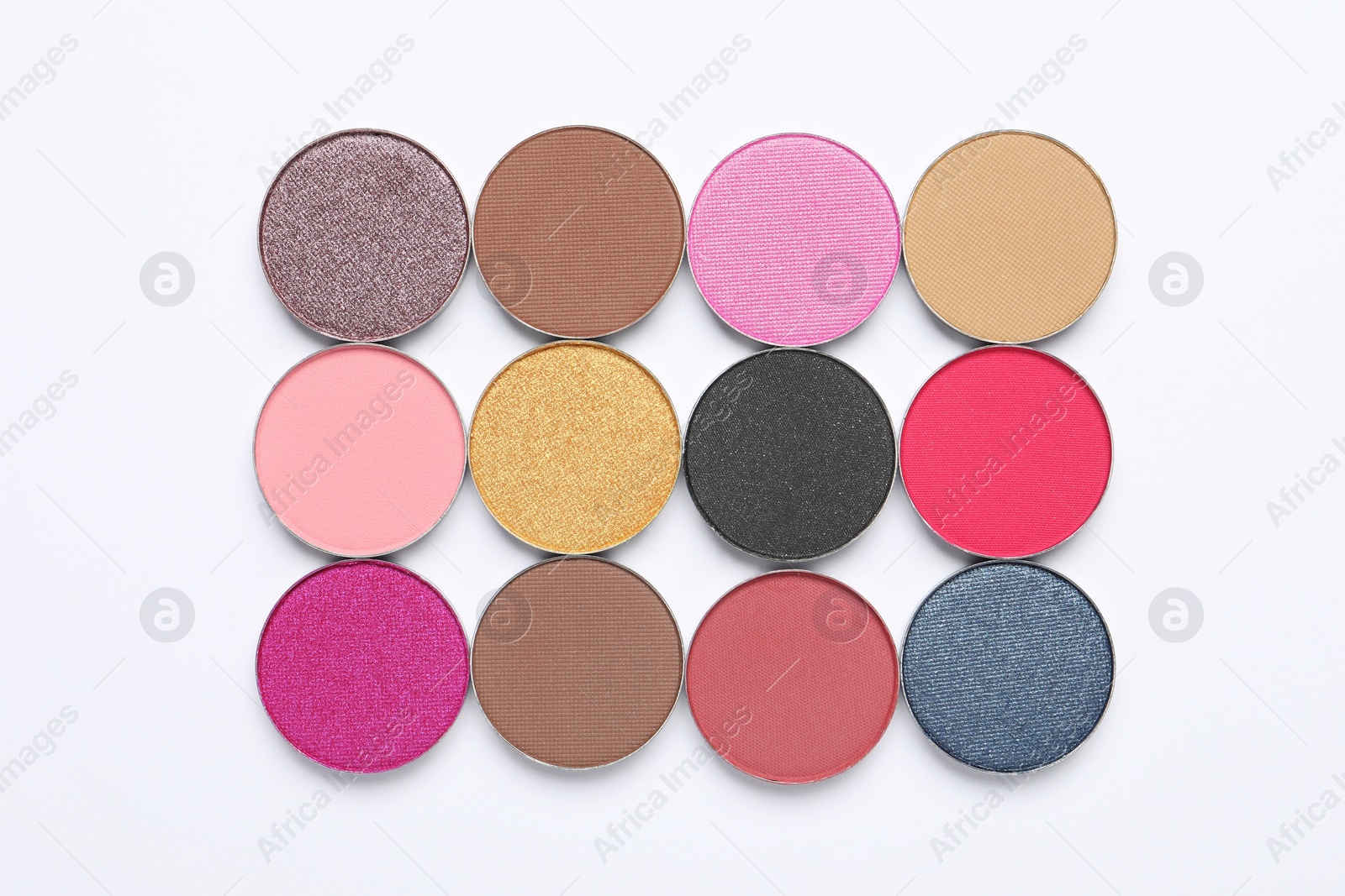 Photo of Beautiful eye shadow refill pans on white background, flat lay