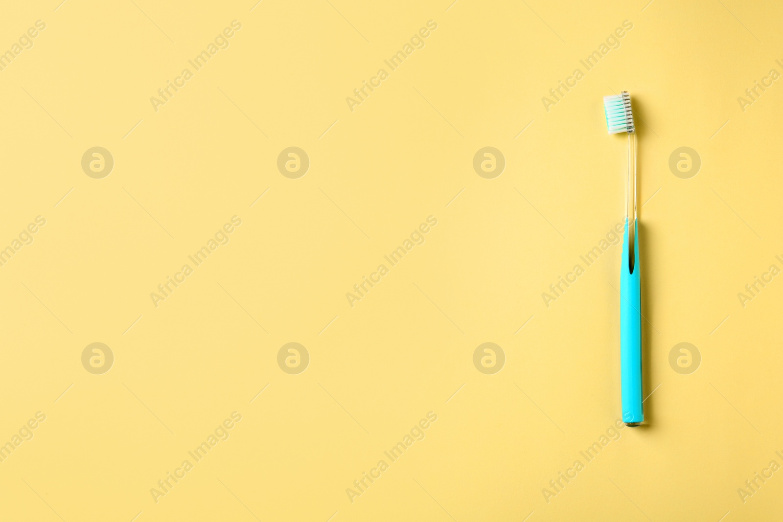 Photo of Manual toothbrush on color background. Dental care