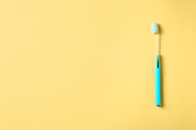 Photo of Manual toothbrush on color background. Dental care