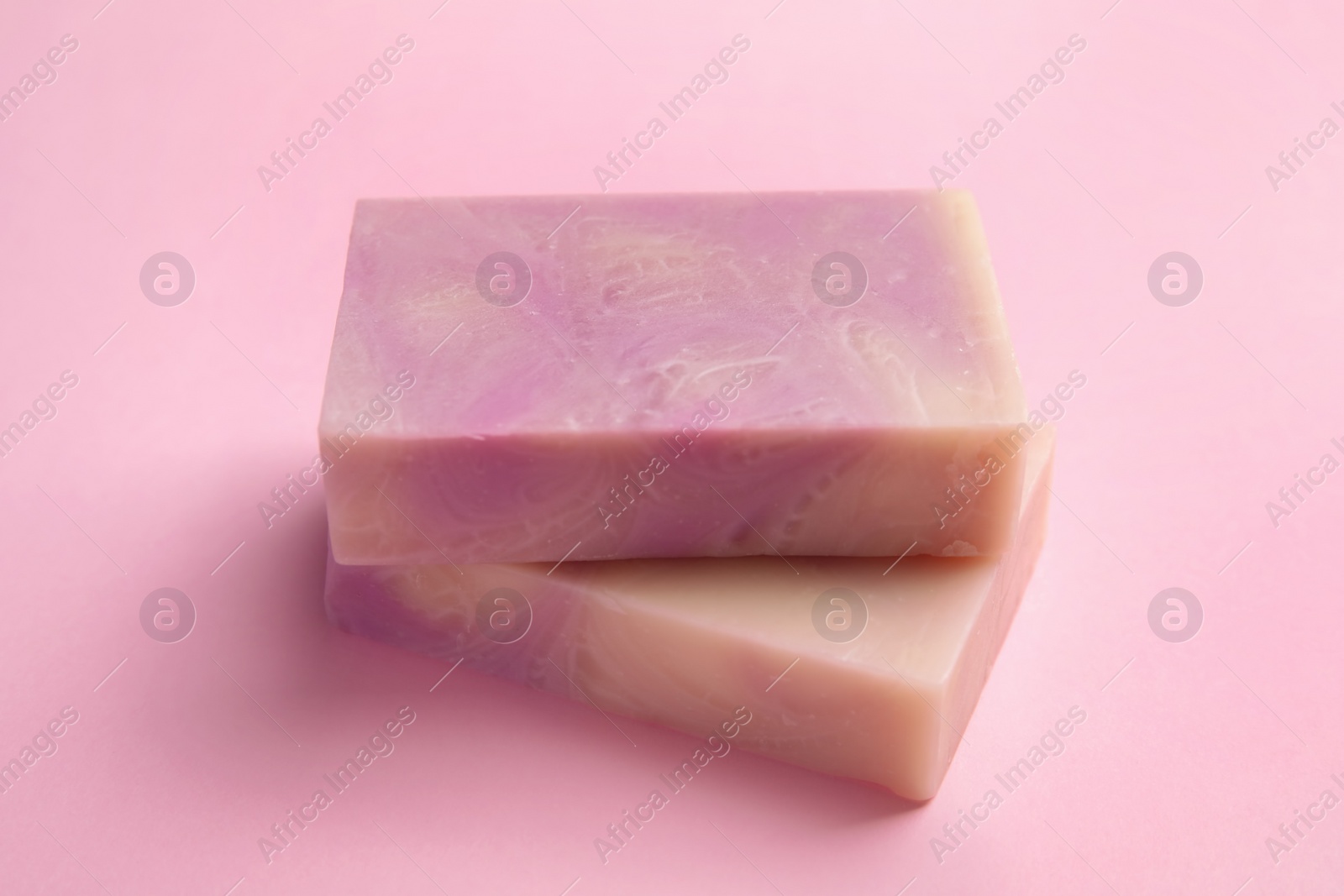 Photo of Hand made soap bars on color background