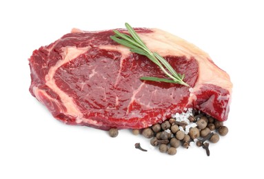 Photo of Piece of fresh beef meat, rosemary and spices on white background