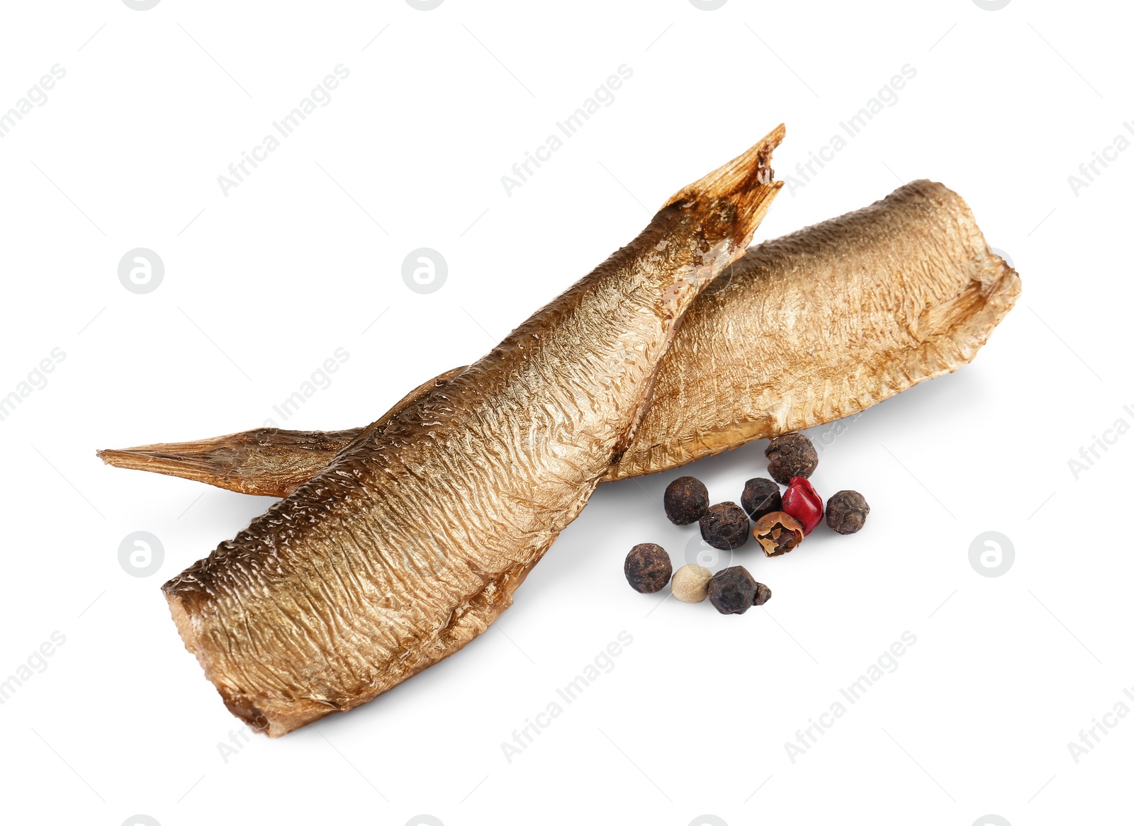 Photo of Tasty canned sprats and peppercorns isolated on white