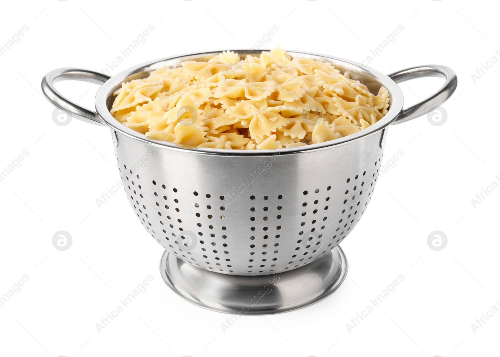 Photo of Cooked pasta in metal colander isolated on white