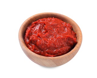 Photo of Wooden bowl of tasty tomato paste isolated on white