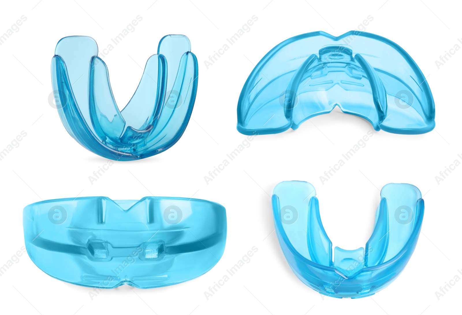 Image of Set with mouth guards on white background. Bite correction treatment