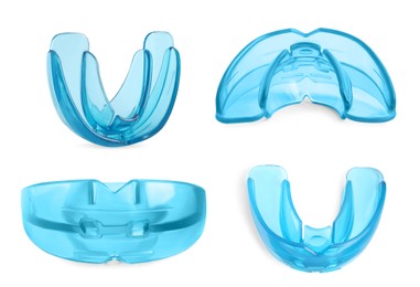 Image of Set with mouth guards on white background. Bite correction treatment