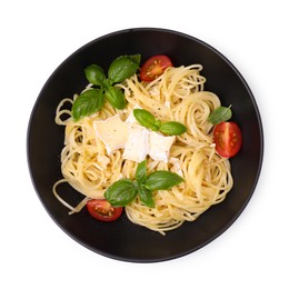Photo of Bowl of delicious pasta with brie cheese, tomatoes and basil leaves on white background, top view