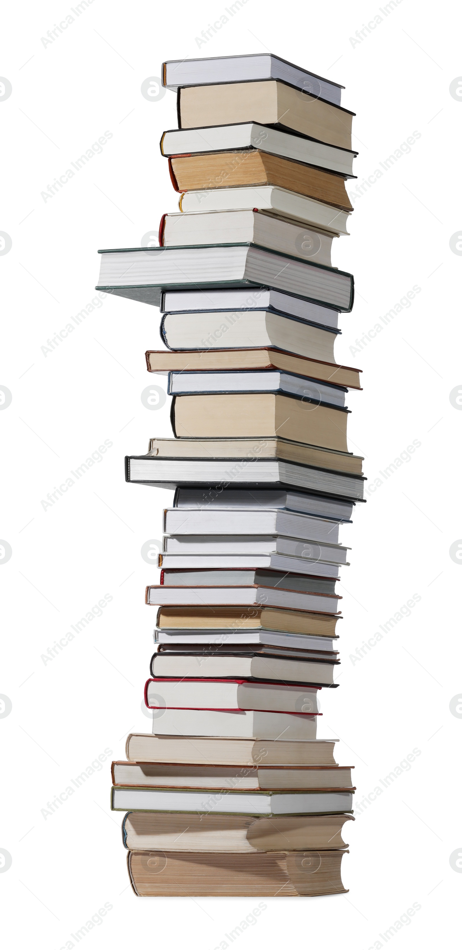 Photo of High stack of many different books isolated on white