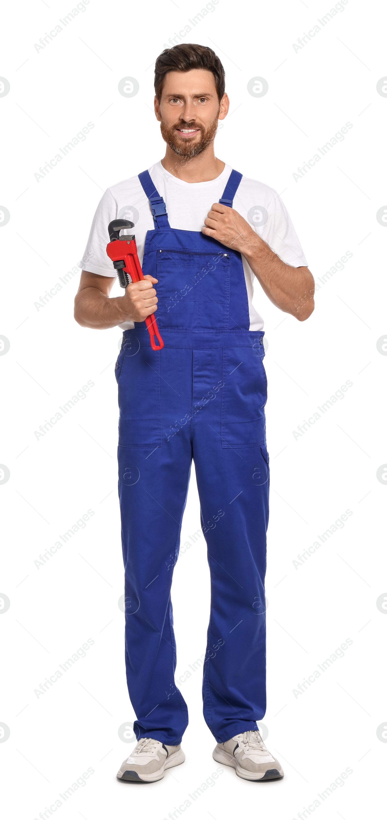 Photo of Professional plumber with pipe wrench on white background