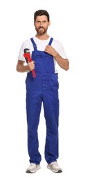 Professional plumber with pipe wrench on white background