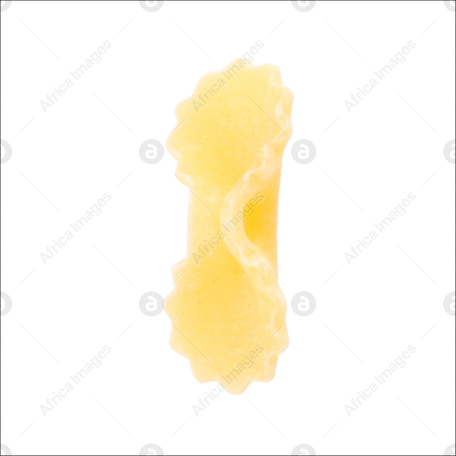 Photo of One piece of raw farfalline pasta isolated on white