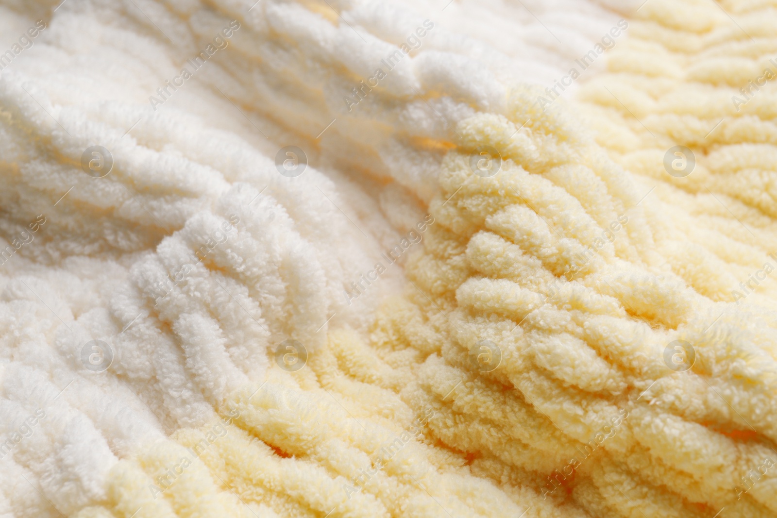 Photo of Texture of soft knitted fabric as background, closeup