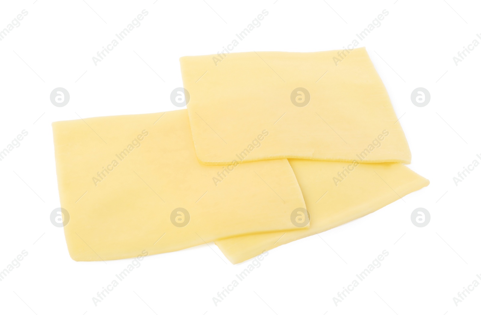 Photo of Slices of tasty fresh cheese isolated on white, above view