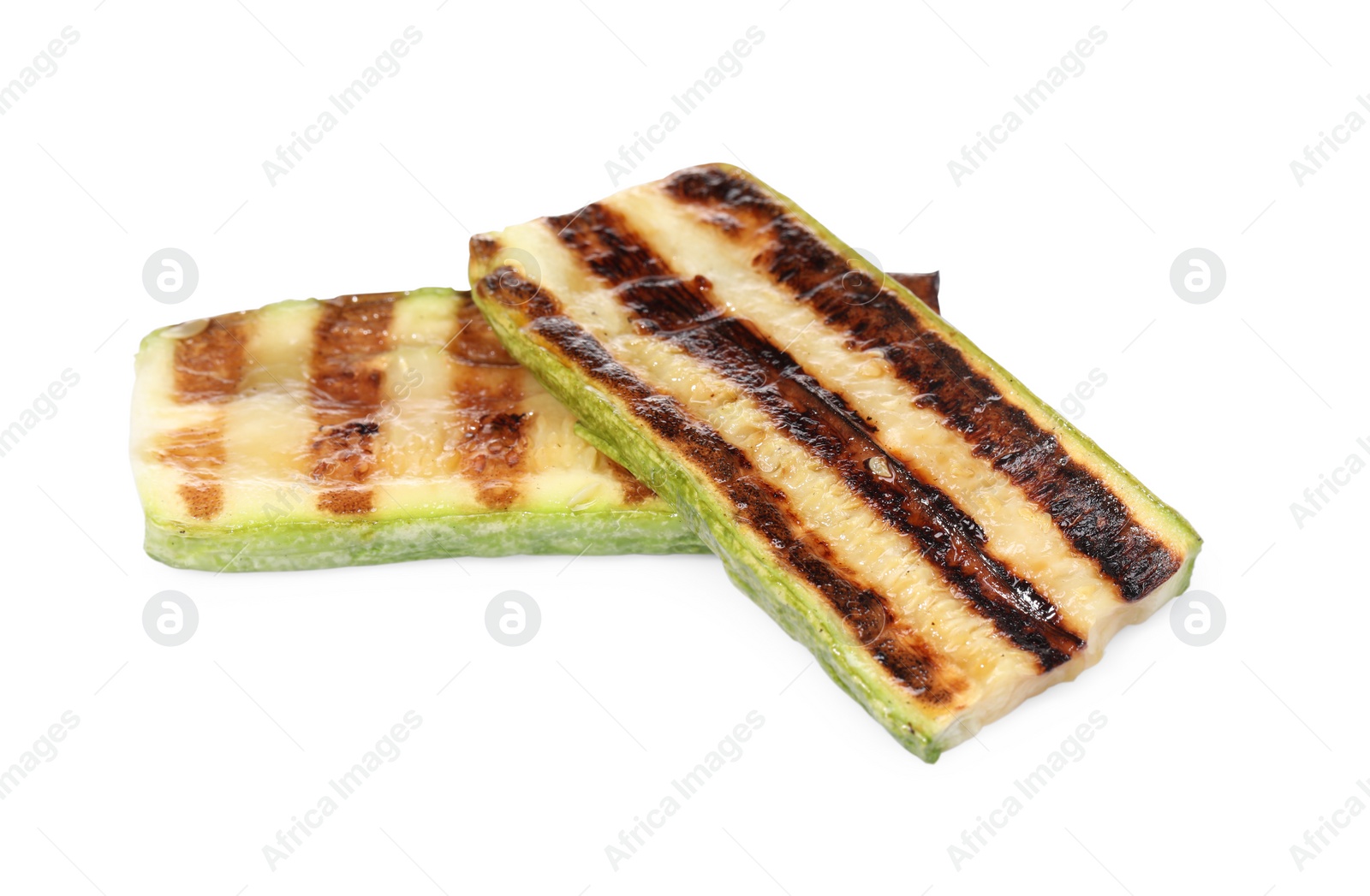 Photo of Slices of delicious grilled zucchini isolated on white