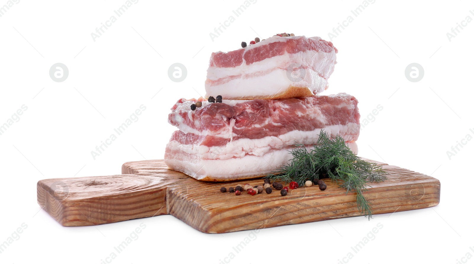 Photo of Pieces of pork fatback served with dill and spices isolated on white